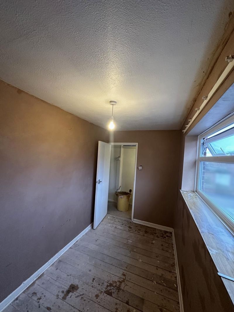 The same box room with every wall skimmed in fresh plaster